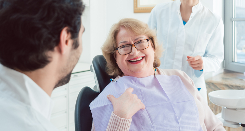 Dentist in Caledon providing dental care for senior patient at Caledon Dental Centre
