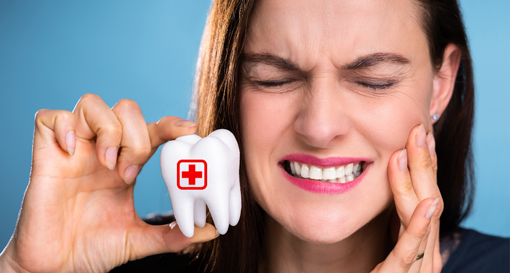 Emergency dentist in Caledon treating patient with severe dental pain at Caledon Dental Centre